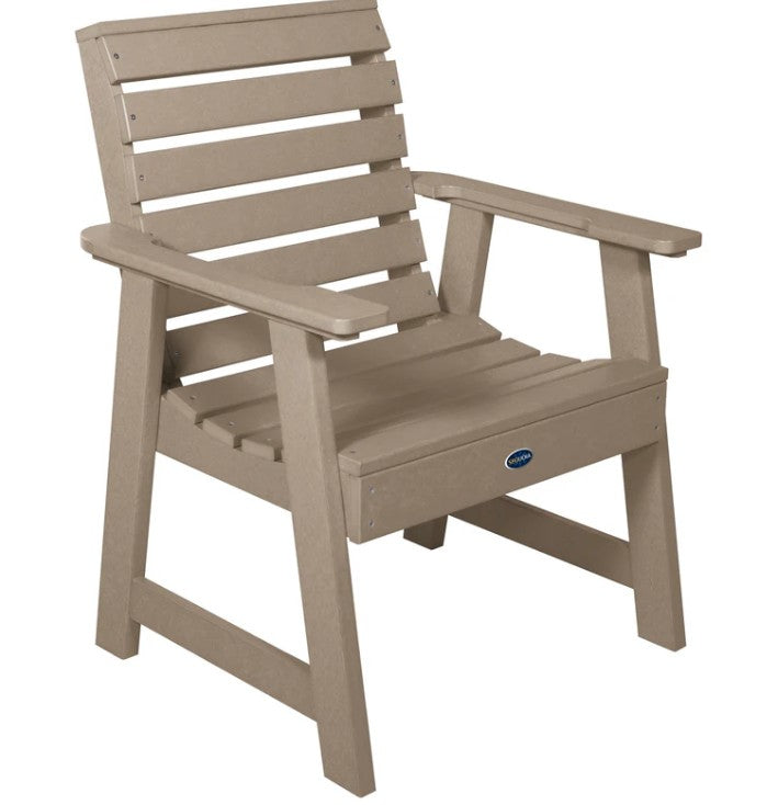 Beige outdoor chair with armrests on a white background
