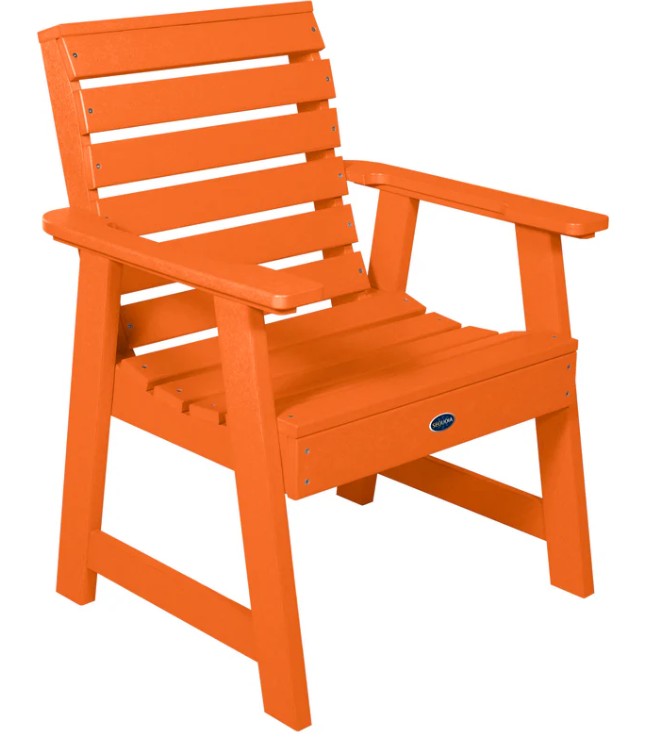 Orange chair with armrests on a white background