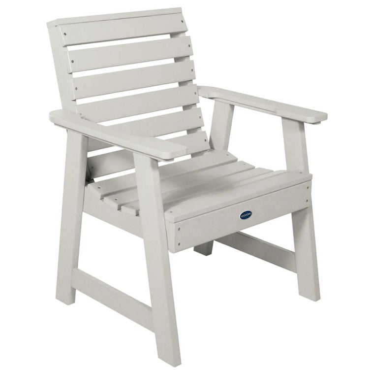 White chair with armrests on a white background