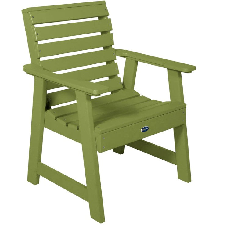 Green chair with a visible brand logo on a white background