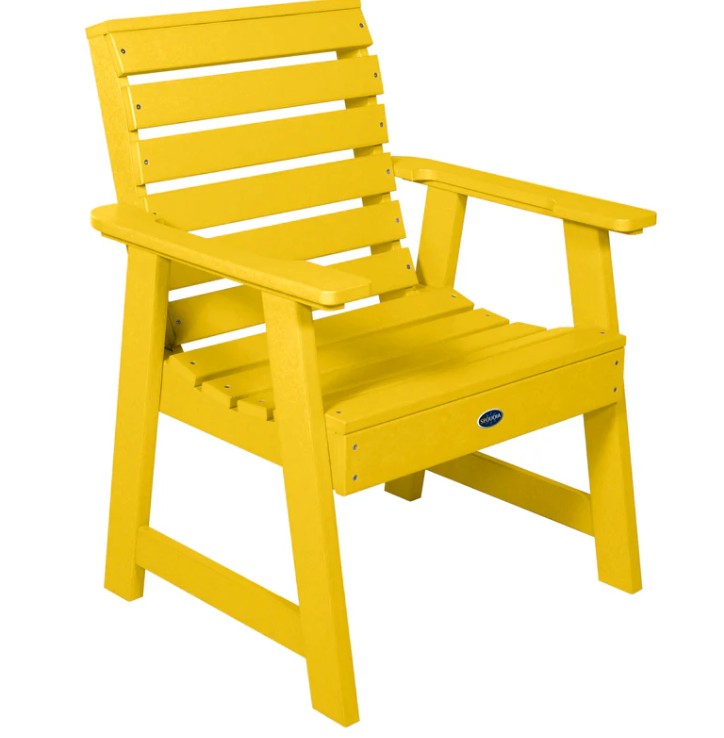 Yellow chair with a visible brand logo on a white background