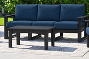 LuxCraft Lanai deep seating sofa with black frame, bare black coffee table and Spectrum Indigo cushions