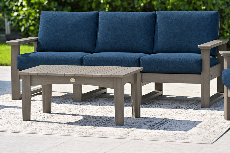 LuxCraft Lanai deep seating sofa with Coastal Gray frame and coffee table, Spectrum Indigo cushions