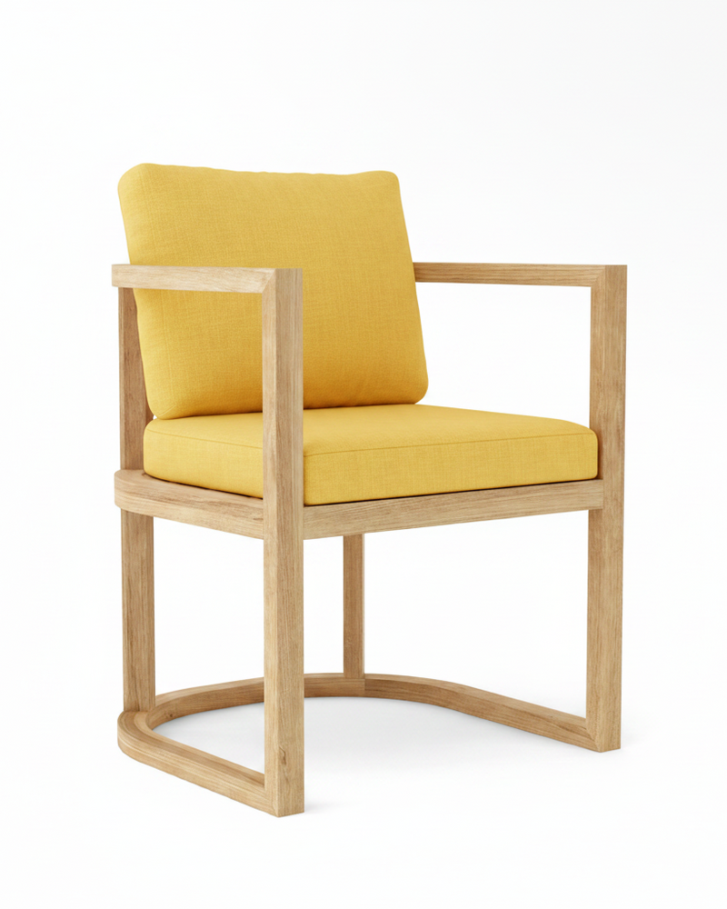 Anderson teak junus dining armchair with buttercup cushions on white background.  