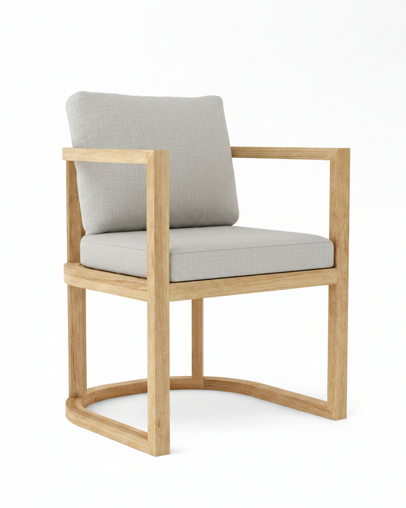Anderson teak junus dining armchair with granite cushions on white background.  