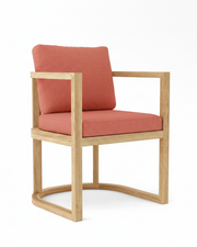 Anderson teak junus dining armchair with henna cushions on white background.  