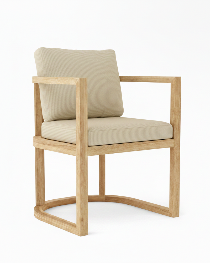 Anderson teak junus dining armchair with antique beige cushions on white background.  