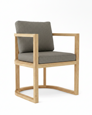 Anderson teak junus dining armchair with bliss smoke cushions on white background.  