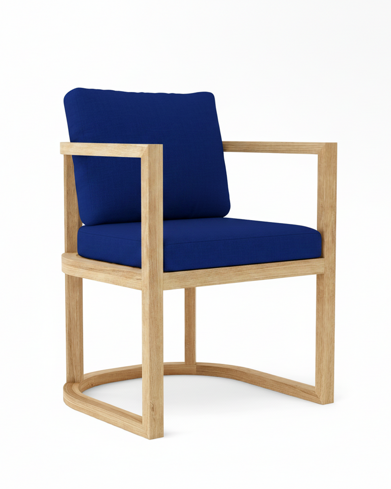 Anderson teak junus dining armchair with true blue cushions on white background.  