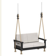 Two-seater swing with white cushions and black frame on a white background