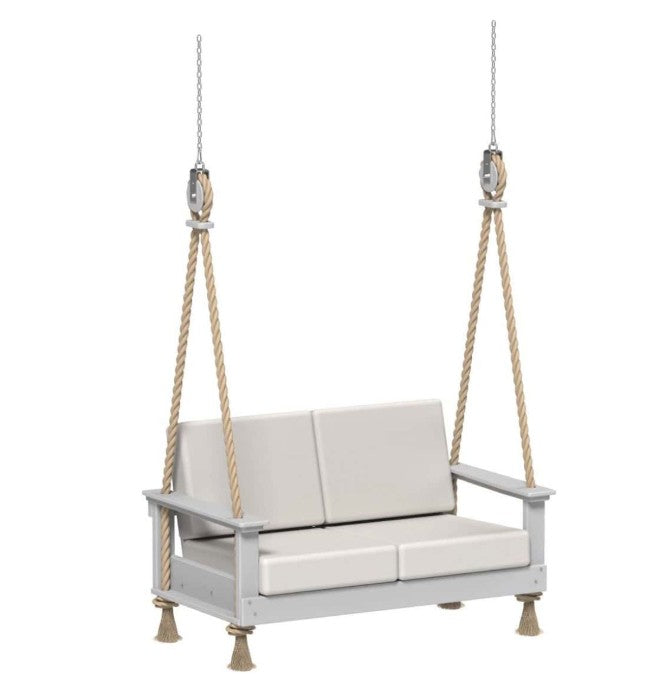 White swing chair with beige cushions on a white background