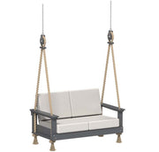 Outdoor swing with gray frame and white cushions on a white background