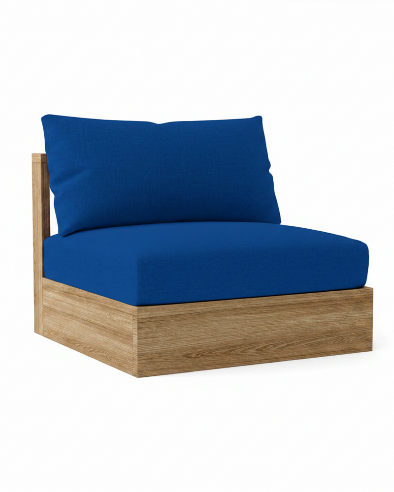 A modern outdoor lounge chair with a thick royal blue cushioned seat and backrest, supported by a light brown wood frame, shown on a solid white background.