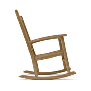 Wooden rocking chair - side view on a white background 