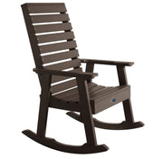 Brown wooden rocking chair on a white background
