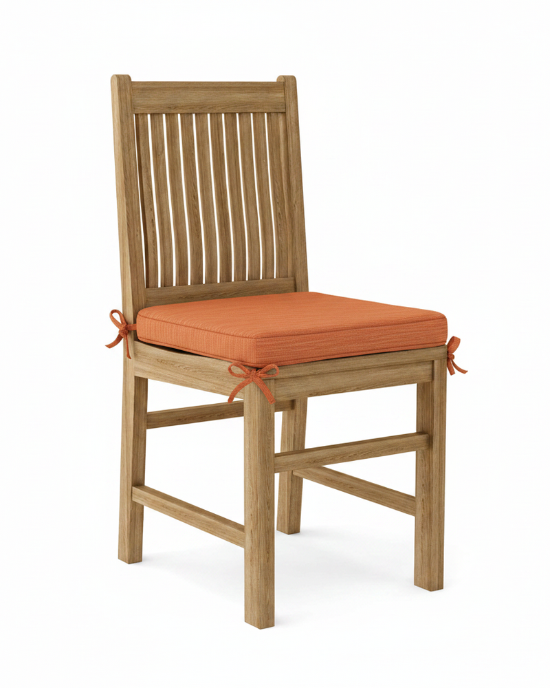 Wooden chair with an orange cushion on a white background
