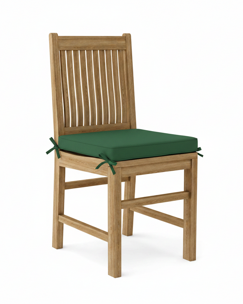 Wooden chair with a green cushion on a white background