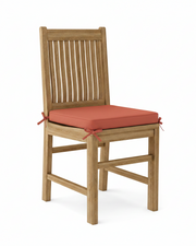 Wooden chair with a henna cushion on a white background