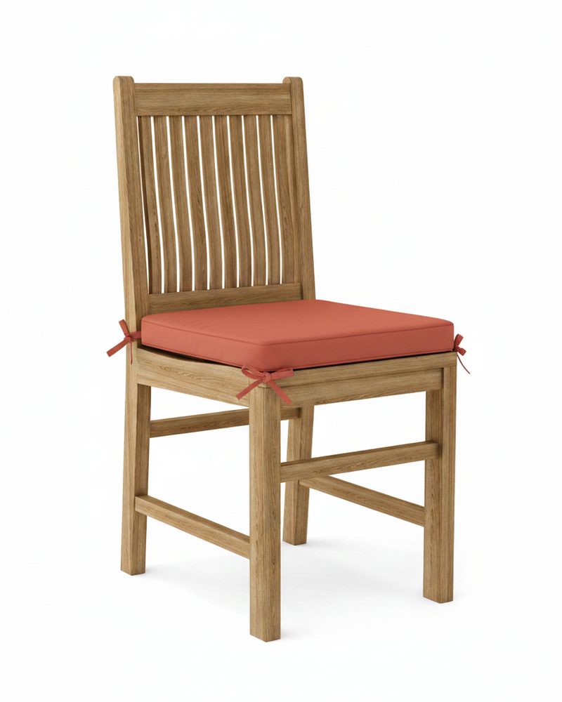 Wooden chair with a henna cushion on a white background