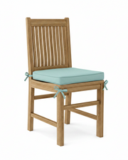Wooden chair with a blue cushion on a white background