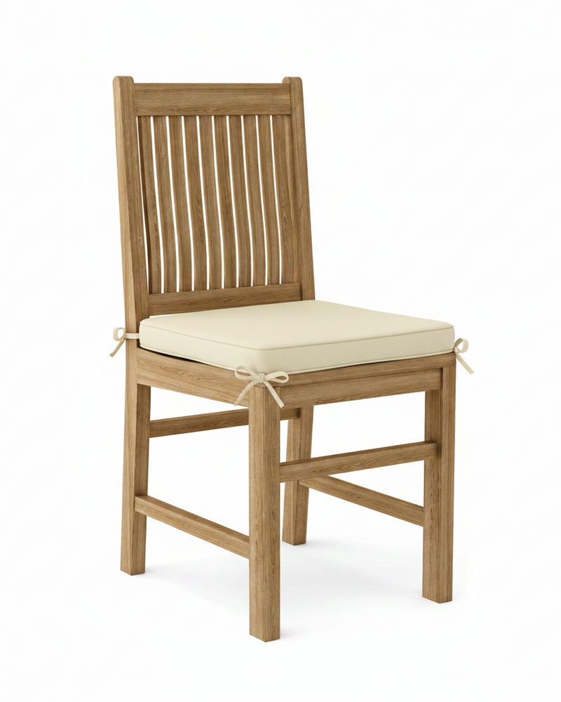 Wooden chair with a cream cushion on a white background