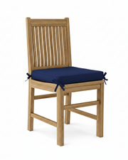 Wooden chair with a navy cushion on a white background