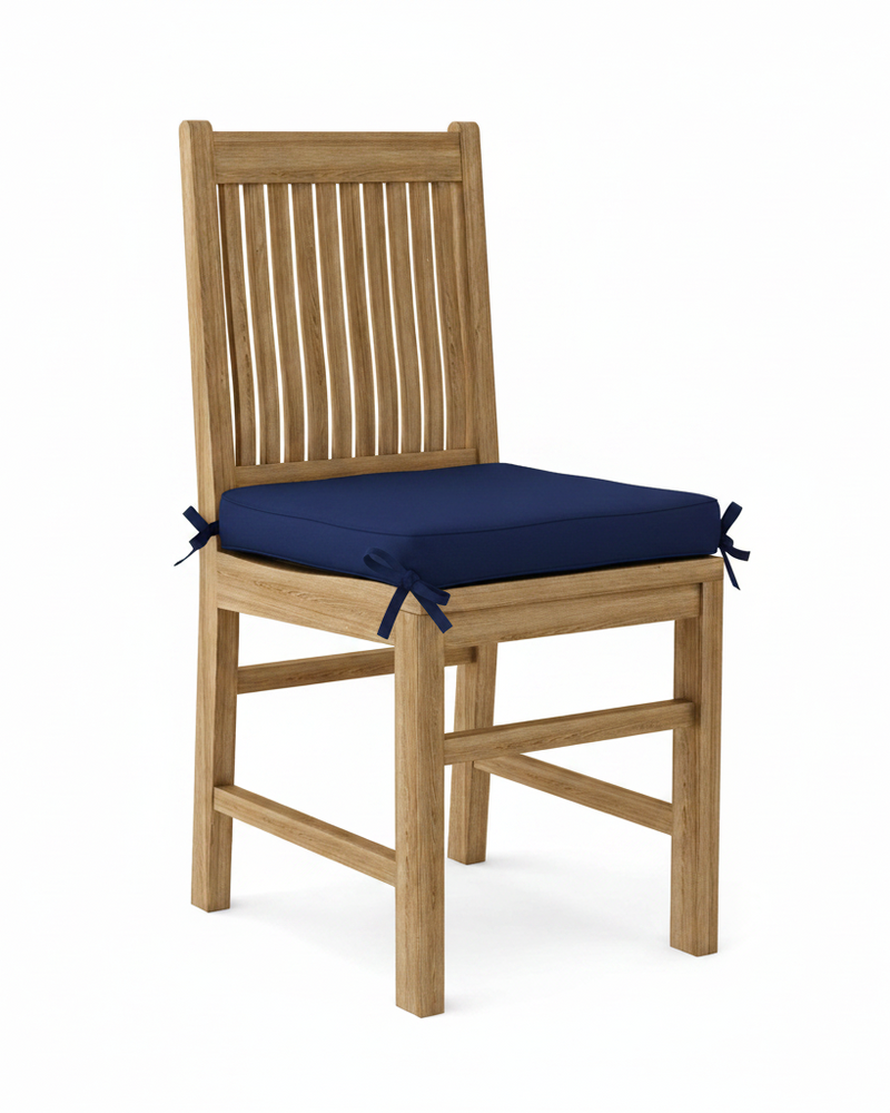 Wooden chair with a navy cushion on a white background