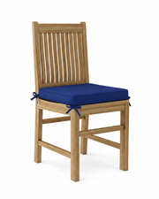 Wooden chair with a blue cushion on a white background