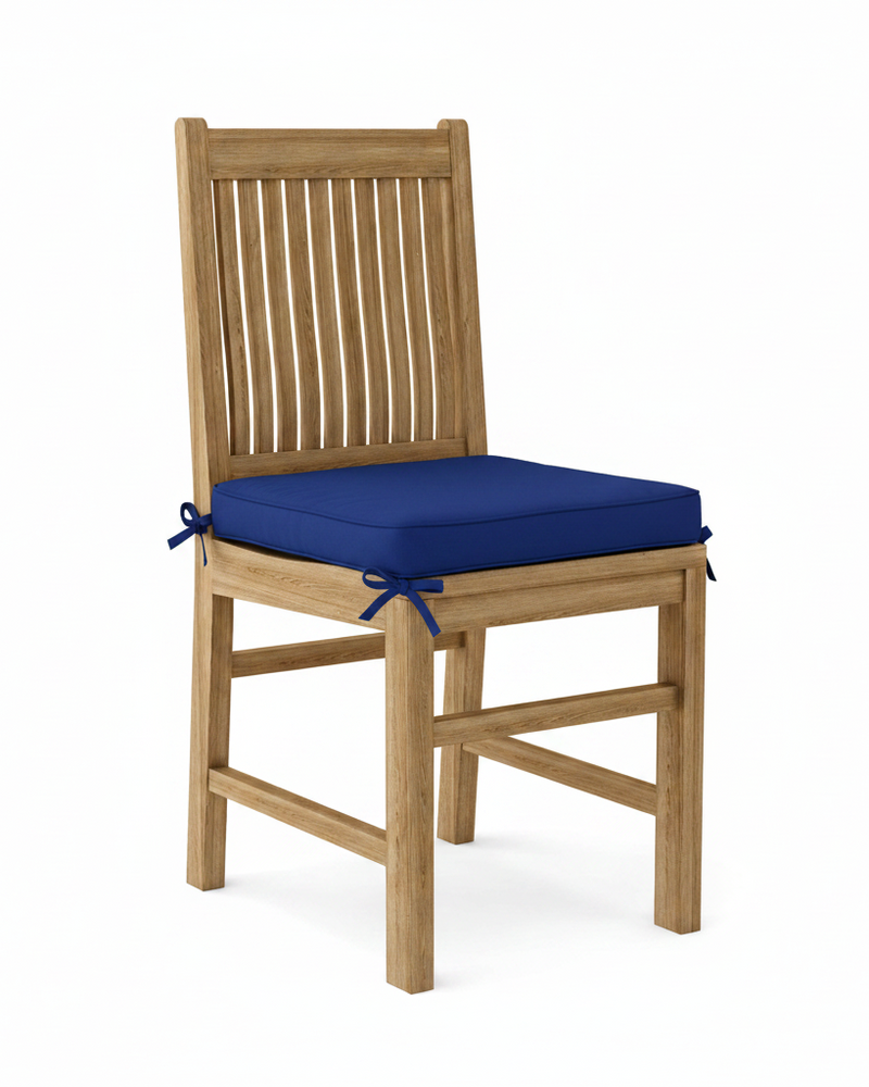 Wooden chair with a blue cushion on a white background