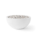 Serenade lightweight natural concrete fire pit with ivory beach stones on a white background.  