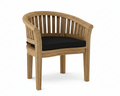 Anderson teak curved dining armchair with black cushion on white background. 
