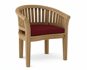 Anderson teak curved dining armchair with burgundy cushion on white background.  
