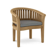 Anderson teak curved dining arm chair with cast slate cushion on white background.