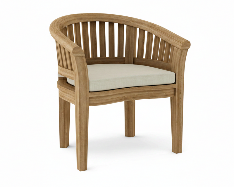 Anderson teak curved dining arm chair with dupione sand cushion on white background. 