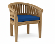 Anderson teak curved dining armchair with pacific blue cushion on white background.  