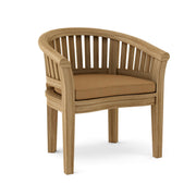 Anderson teak curved dining arm chair with teak cushion on white background.  