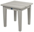 Gray outdoor table with a visible brand logo on a white background