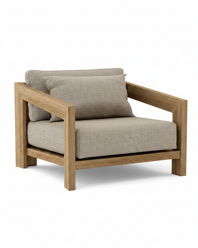 Smyrna teak lounge chair with cast silver cushion on white background.  