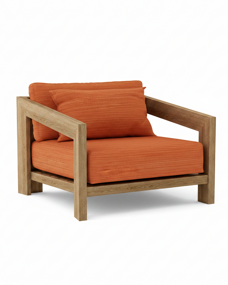 Smyrna teak lounge chair with dupione papaya cushion on white background.  