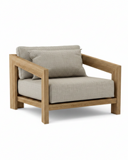 Smyrna teak lounge chair with granite cushion on white background.  