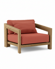 Smyrna teak lounge chair with henna cushion on white background.  