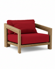 Smyrna teak lounge chair with jockey red cushion on white background.  