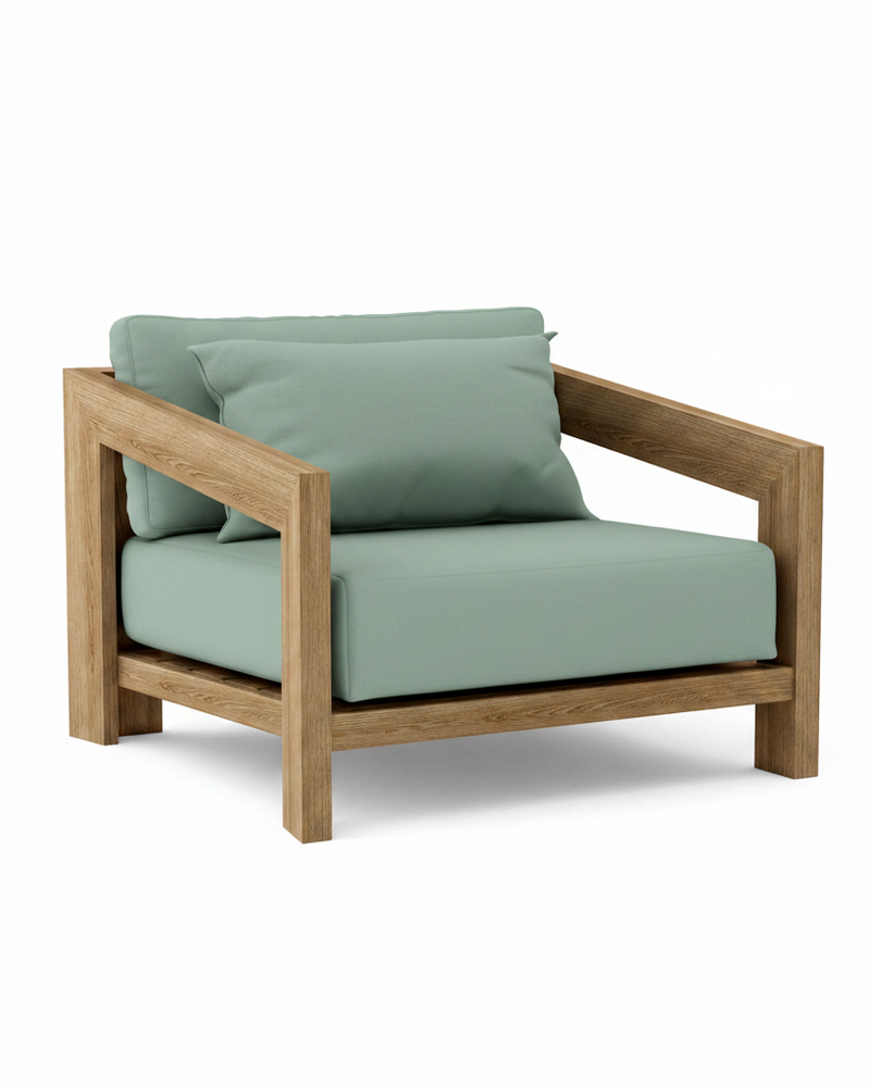 Smyrna teak lounge chair with spa cushion on white background.  