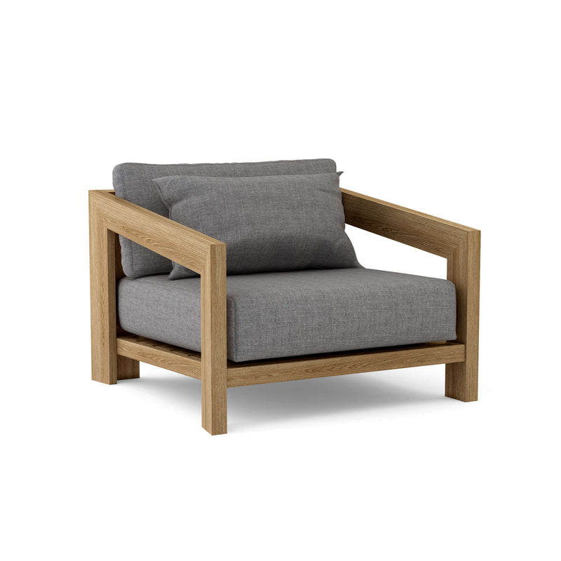 Smyrna teak lounge chair with cast slate cushion on white background.  