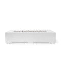 Sonoma 56-inch natural concrete fire pit with ivory beach stone on a white background. 