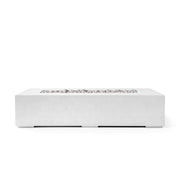 Sonoma 56-inch natural concrete fire pit with ivory beach stone on a white background. 