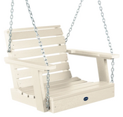 A light beige slatted porch swing bench with silver hanging chains, shown on a plain white background. A small blue oval logo badge is visible on the front right side.