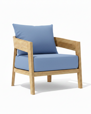Toscana teak lounge chair with cast ocean cushion on white background. 