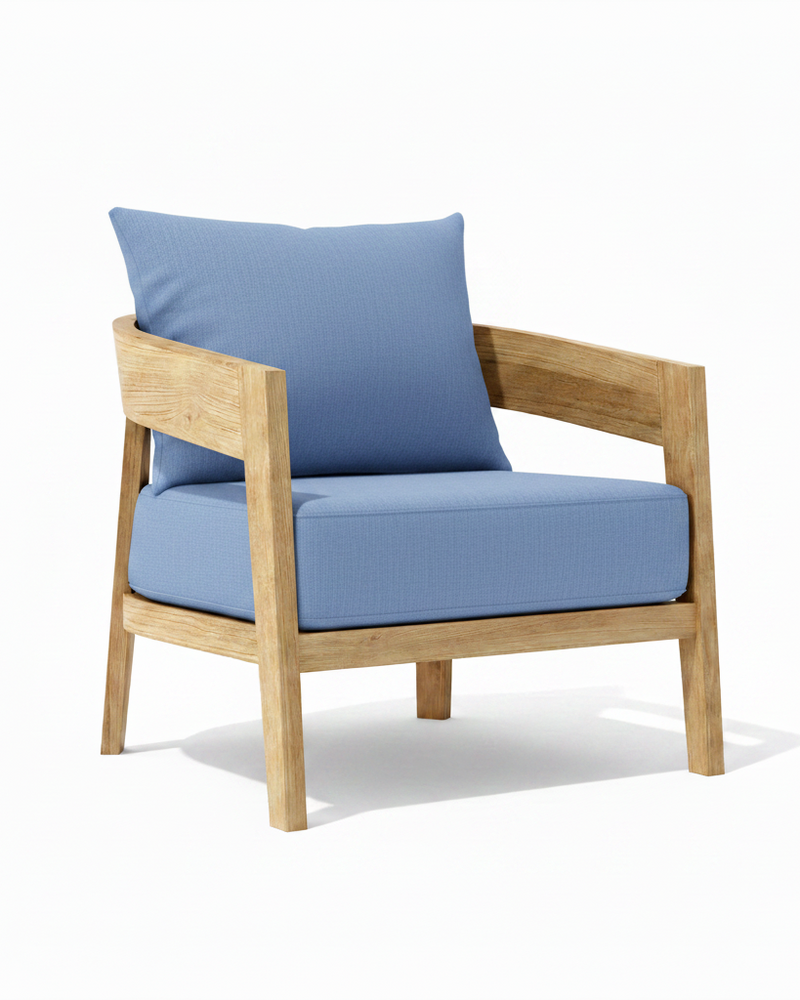 Toscana teak lounge chair with cast ocean cushion on white background. 