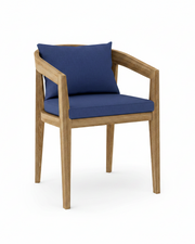 Toscana teak dining chair with true blue cushion on white background.